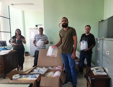 Voluntários doam protetores faciais para profissionais de saúde de Lafaiete